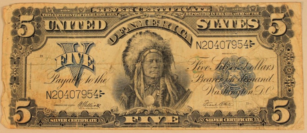 1899 Series Five Dollar Silver Certificate: depicting Lakota Indian Chief Running Antelope. serial number N20407954. ungraded.