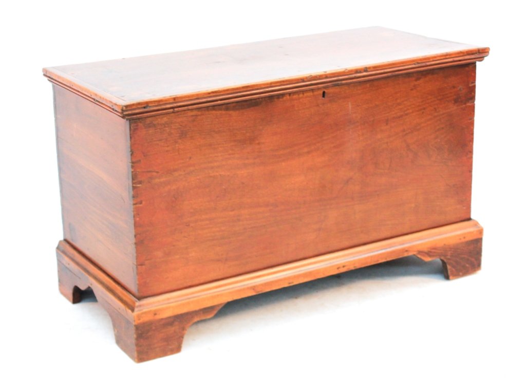 Federal Walnut and Poplar Blanket Box: probably Pennsylvania, early 19th century. molded top over dovetailed box with till, resting on bracket feet. H22 1/2" W38" D17 1/2"