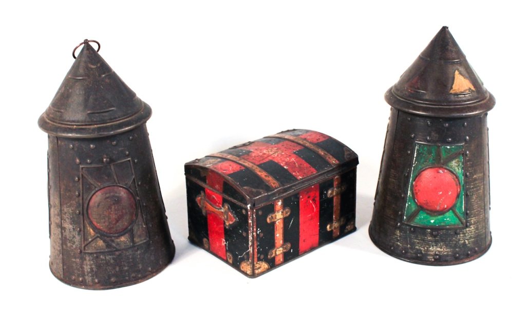 Three Figural British Biscuit Tins: first half of the 20th century. two rare Huntley & Palmer lantern tins together with a Hudson Scott & Sons monogrammed, lithograph-printed trunk tin. lantern: H9 ¼” Dia 5 ¼”