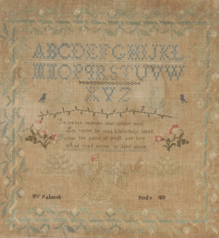 Fine 19th Century American Needlework Sampler: dated 1831. linen ground with wool, cotton, and silk thread. signed Rebecca Purdy at bottom. details include a floral vine wrapping around a frame border, the alphabet, birds, flowers, and a central p