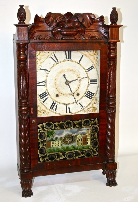 Classical Carved Mahogany Mantel Clock: Jeromes' & Darrow, Bristol, Conn., circa 1825. carved case retaining original tablet, thirty-hour wood movement on carved pad feet. H30 1/4" W17 1/2"