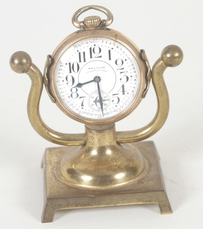 Waltham "Vanguard" 23; Railroad Watch: circa 1941. vanguard movement, 23j, serial number 30,751,444 in gold filled case; with holder. Dia. 1 15/16" From the Private Collection of Mr. Carl Butler, Clayton, Georgia.