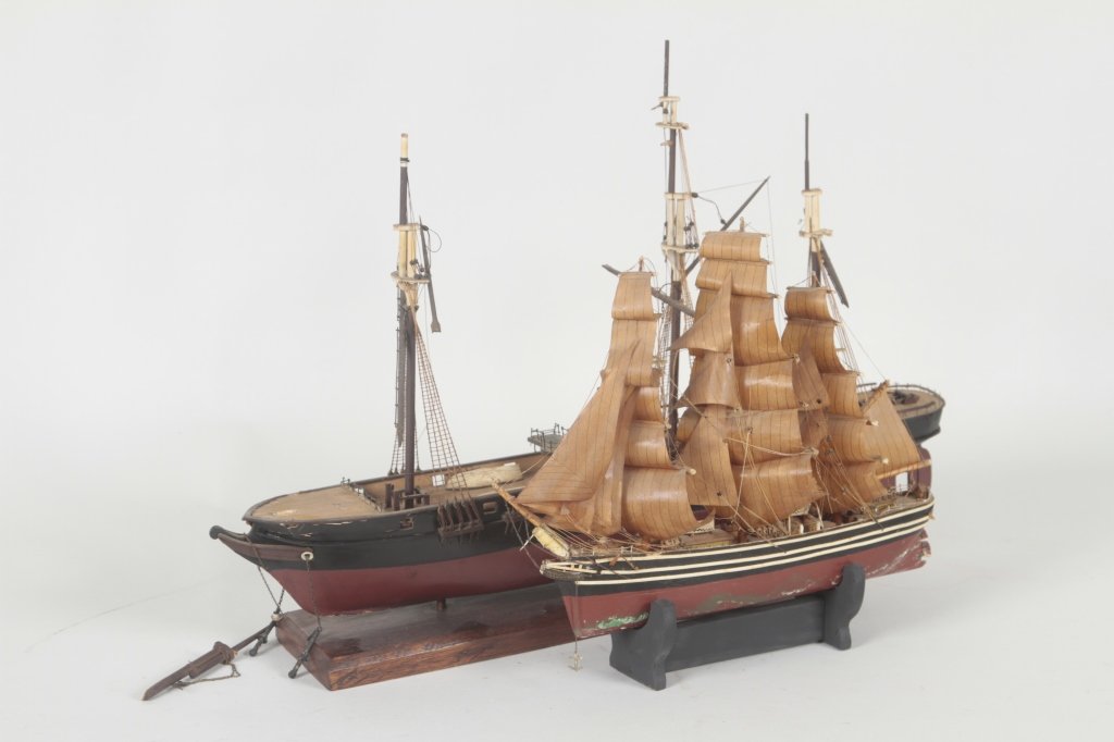 Two Antique Clipper Ship Models: unnamed clipper ships with lines complete. one with, one without sails. both on wooden stands. H16” L23”, H12”, L14” From the Private Collection of Mr. Carl Butler, Clayton, Georgia.