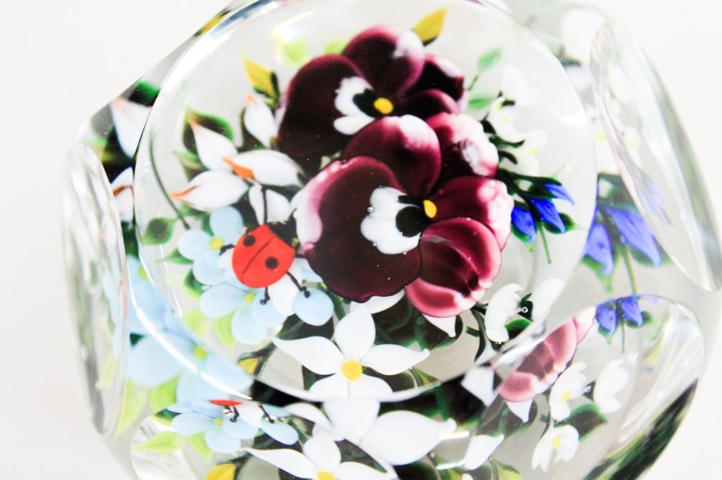 Rick Ayotte Floral Paperweight: Nashua, NH, 1988. large floral weight with concave facets centering pansies with lady bug. signed "Ayotte, 24/50, '88". Dia. 3 1/2" From the Estate of Anita Hill, Jupiter, Florida.