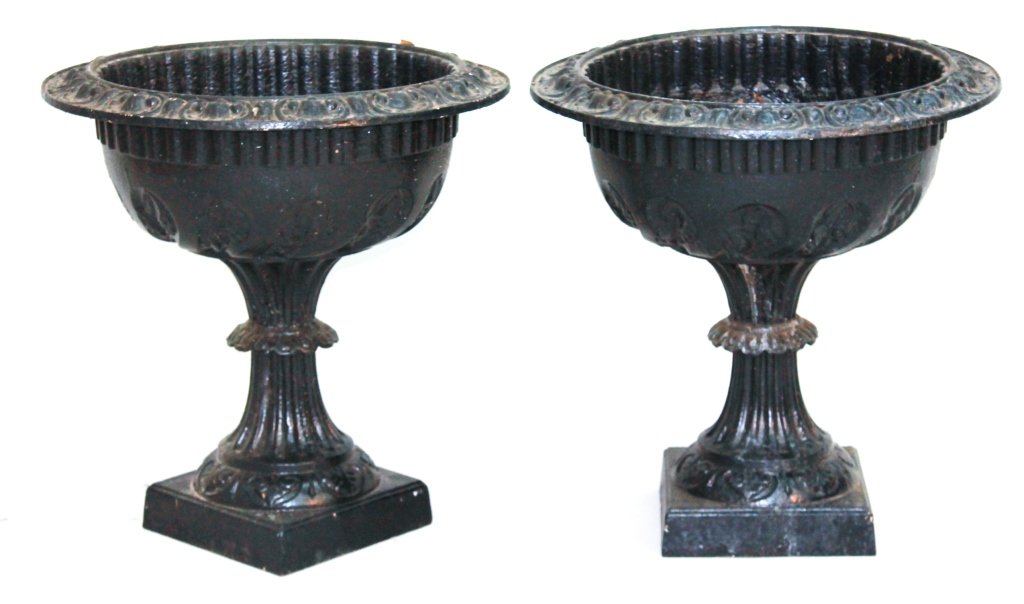 Pair Cast-Iron Garden Urns: late 19th century. circular, ornamental urns on pedestals, painted black. H21 1/2" Dia.20 1/2" From the Private Collection of Mr. Carl Butler, Clayton, Georgia.