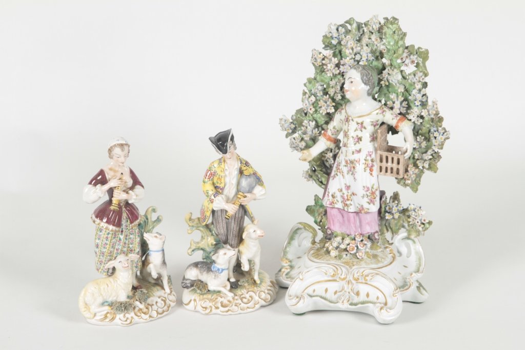 Three German Porcelain Figural Groups: late 19th/early 20th century. male & female bearing Meissen marks. H7 1/4" H7 1/4" H10 3/4" From the Private Collection of Mr. Carl Butler, Clayton, Georgia.