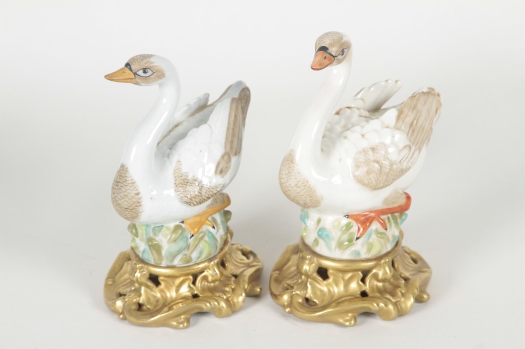 Pair Mattahedeh Porcelain Swans: Italy, 20th century. exhibiting good detail. H8" From the Private Collection of Mr. Carl Butler, Clayton, Georgia.