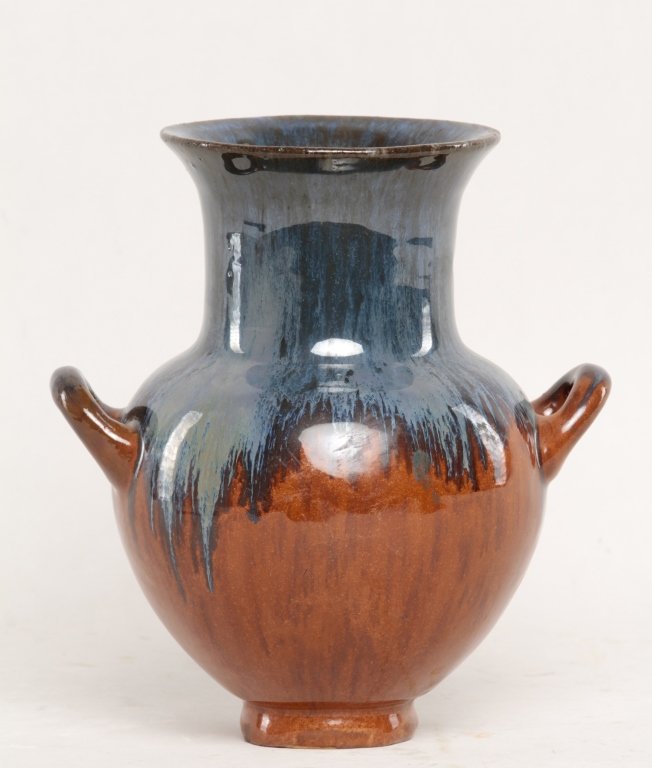 Fulper Art Pottery Open Arm Vase: New Jersey, early 20th century. exhibiting dramatic two-tone chrome gaze, bearing stamp at base. H8" From the Estate of Anita Hill, Jupiter, Florida.