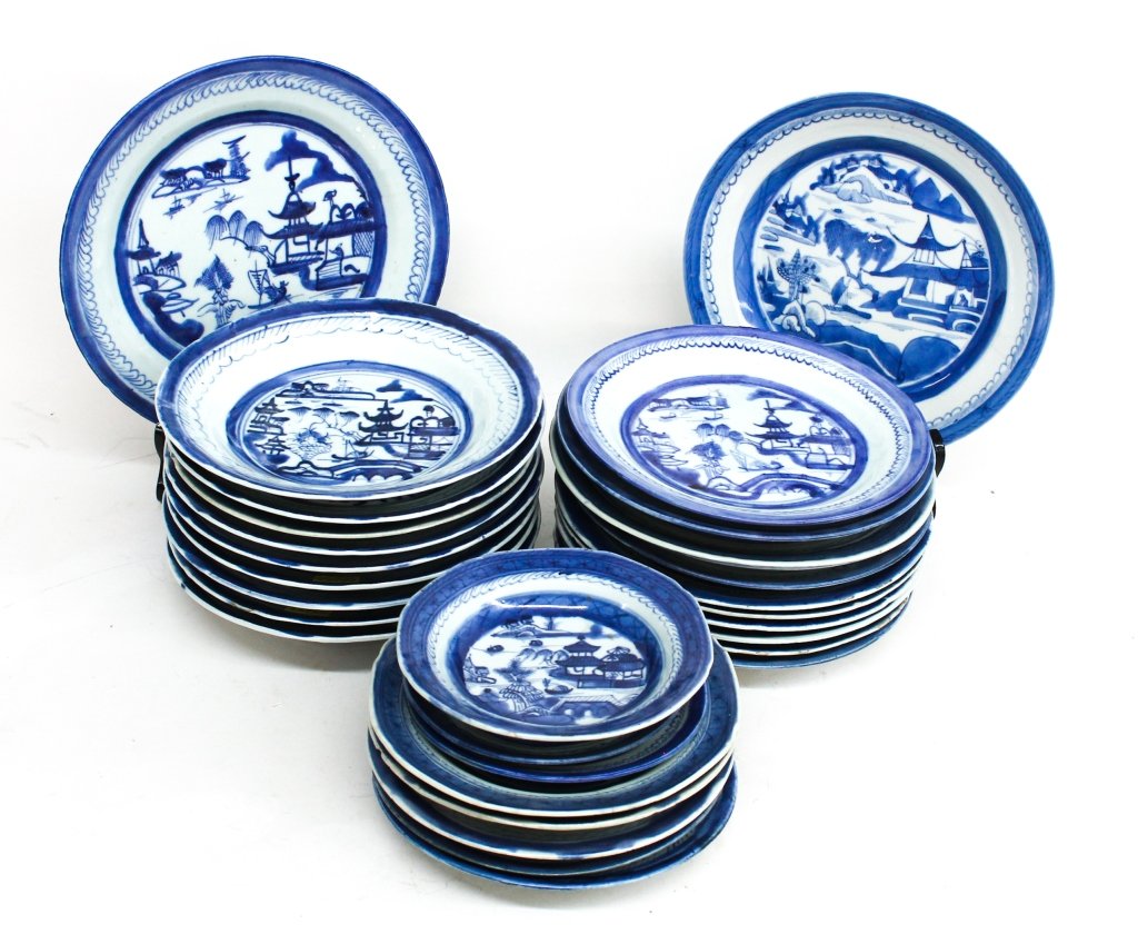 Canton Pattern Chinese Export Porcelain Service: 19th century. three dinner plates, nine soup plates, eleven salad plates, five dessert plates, two bread plates, and one small bowl. From the Private Collection of Mr. Carl Butler, Clayton, Georgia.