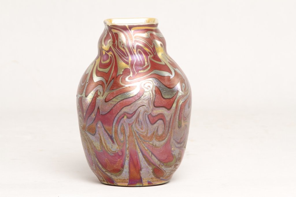 Very Fine Iradecent Art Glass Vase: probably Loetz, late 19th/early 20th century. exhibiting exquisite detail and form. unsigned with polished pontil. possibly by Koloman Moser. H6 7/8" W5 3/8" From the Estate of Anita Hill, Jupiter, Fl