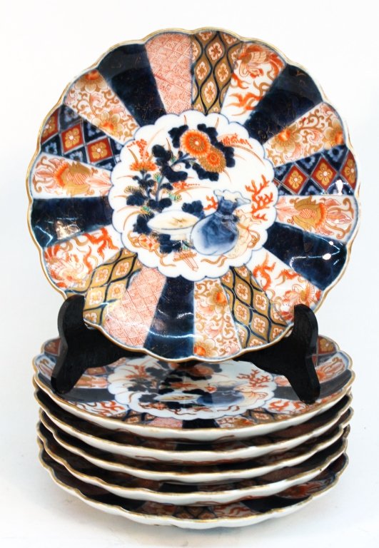 Six Japanese Export Porcelain Imari Salad Plates: 19th century. scalloped edges, gilt detail, bearing character on base. Dia. 8 ½” From the Private Collection of Mr. Carl Butler, Clayton, Georgia.