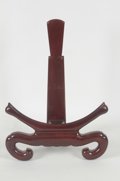Antique Japanese Carved Hardwood Stand: for displaying large porcelain chargers. H23 ½” W17 ½” From the Private Collection of Mr. Carl Butler, Clayton, Georgia.