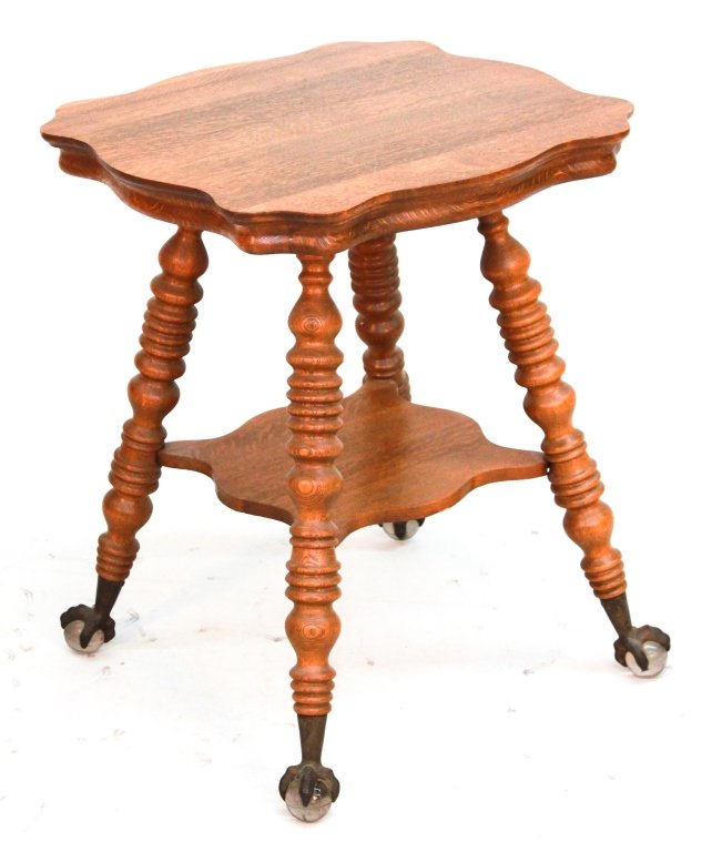 American Oak Arts & Crafts Table: circa 1890. with brass feet and gripping glass balls. H30" W24 1/4" D24 1/4" From the Estate of Anita Hill, Jupiter, Florida.