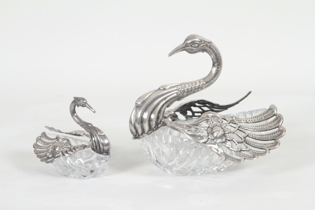 Two Crystal Swan Dishes: likely German. salt and nut dish with reticulated, silver plated wings that open outward. larger: H8 ¼” W9” From a West Palm Beach Private Collection.