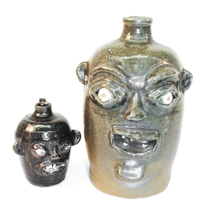 Two Southern Stoneware Face Jugs: Georgia, 20th century. Ray Chitwood and Matthew Hewell. H12" H6" From the Private Collection of Mr. & Mrs. Gary Thompson, Travelers Rest, South Carolina.