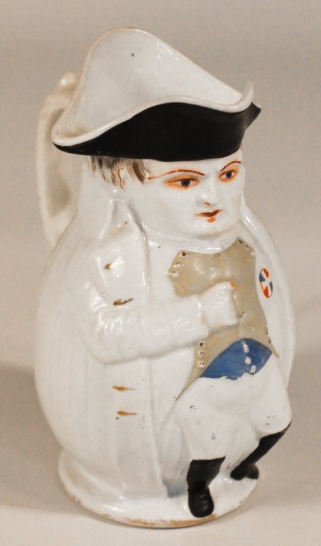 Rare Morris and Williams Toby Pitcher: Columbia Art Pottery, Philadelphia, PA, circa 1895. whiteware Toby pitcher with figure in tricorn hat, yellow vest and black boots. printed stamp on bottom "PAT APL FOR ALFRED B. EVANS PHILA. PA." the