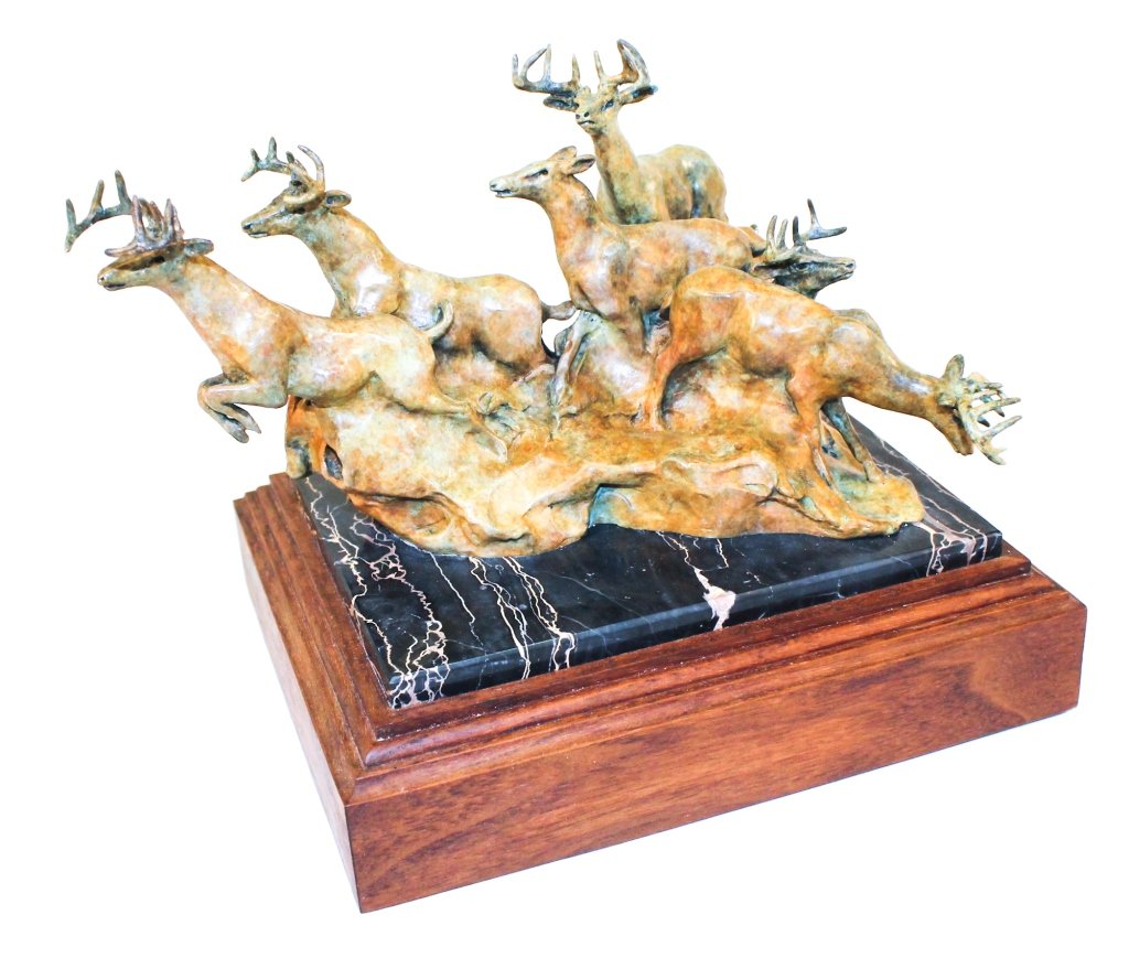 Sherry Salari Sander: (Montana, born 1941) patinized bronze of Deer at Caution. signed 8/50 91. H7" W7 1/4"L10" Private Atlanta, Georgia Collection.