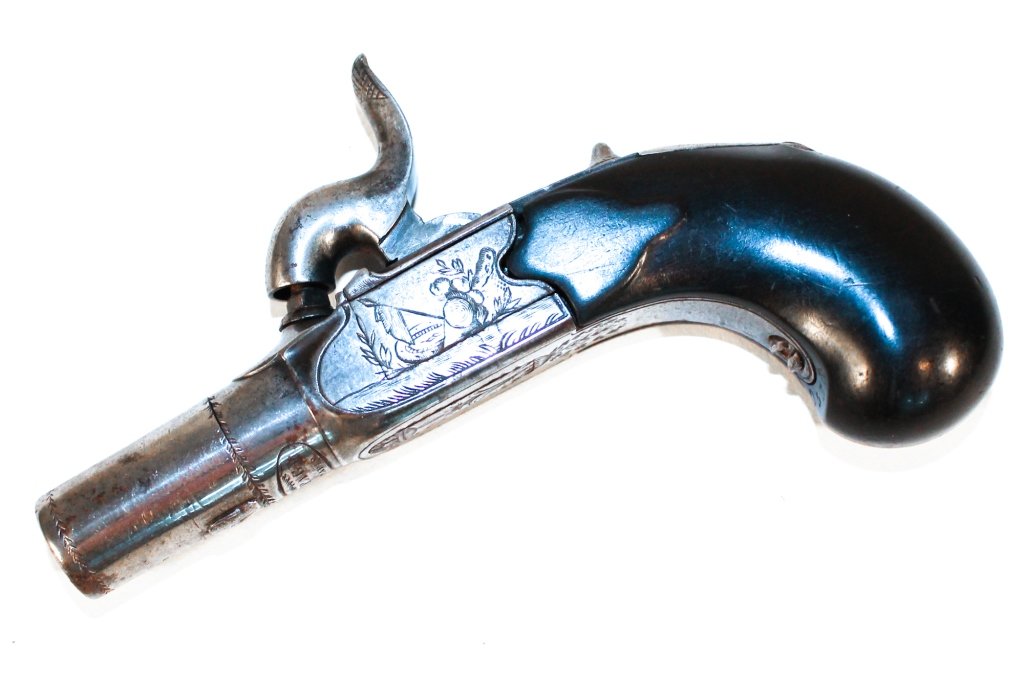 Uncommon French Single Shot Deringer Pistol: LePage Paris France, mid to early 19th century. gun is exquisitely engraved/chased with detail of a war drum, axe and flag and other pictorial detail. Serial #2538. Private Upcountry, South Carolina C
