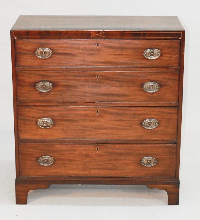 George III Inlaid Mahogany Chest of Drawers: circa 1820. with well inlaid escutcheon and banding at top cornice. H39 3/4" W36 1/8" D16 3/4"