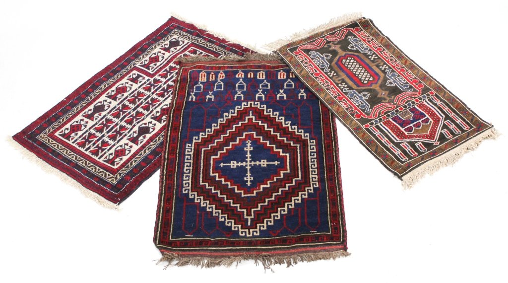 Three Baluch Rugs: 20th century. 4' 3" x 2' 1"; 4' 1" x 2' 8"; 4' 8" x 2' 10"