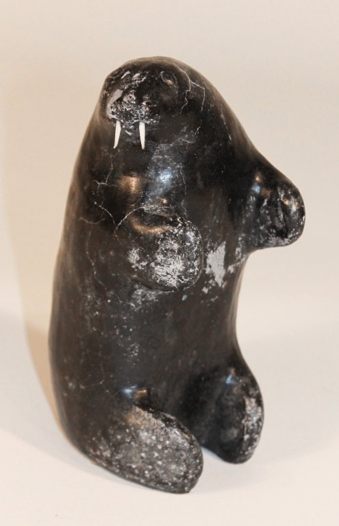 Native American Eskimo or Inuit Carving: early 20th century. carved stone walrus. unsigned. H7"