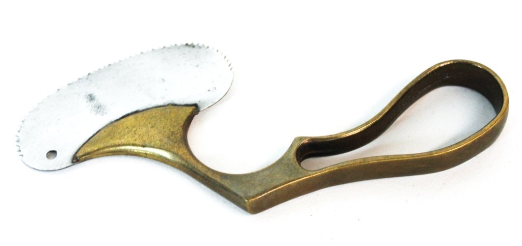 Antique Civil War Era Surgeon's Bone Saw: mid 19th century. unmarked with brass handle and steel blade. L6" H3" Private Collection of Dr. Charles Webb, Campobello, South Carolina.