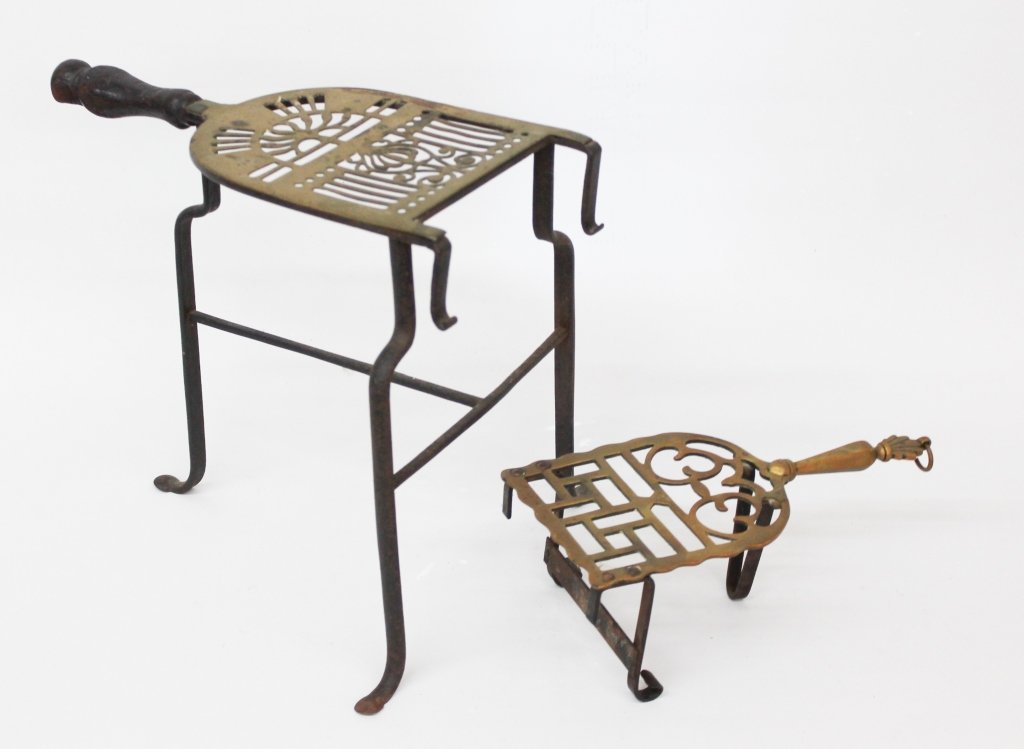 Two Antique Fireplace Trivets: 19th century. each brass with wrought iron base. H12" H4" Private Collection of a Carolina Gentleman.