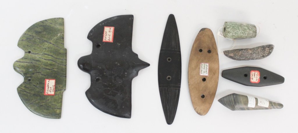 Collection Native American Stone Gorgets: from Floyd County Georgia, Jackson County Alabama, Knox County Indiana, Hillsdale County Michigan. varying sizes and colors. several with old labels. Private Collection of a Carolina Gentleman.