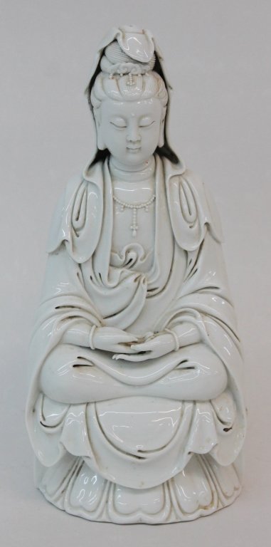 Antique Chinese Porcelain Guan Yin: 18th or 19th century. blanc de chine figure of seated Gum Yin exhibiting fine detail and form. H11 5/8"