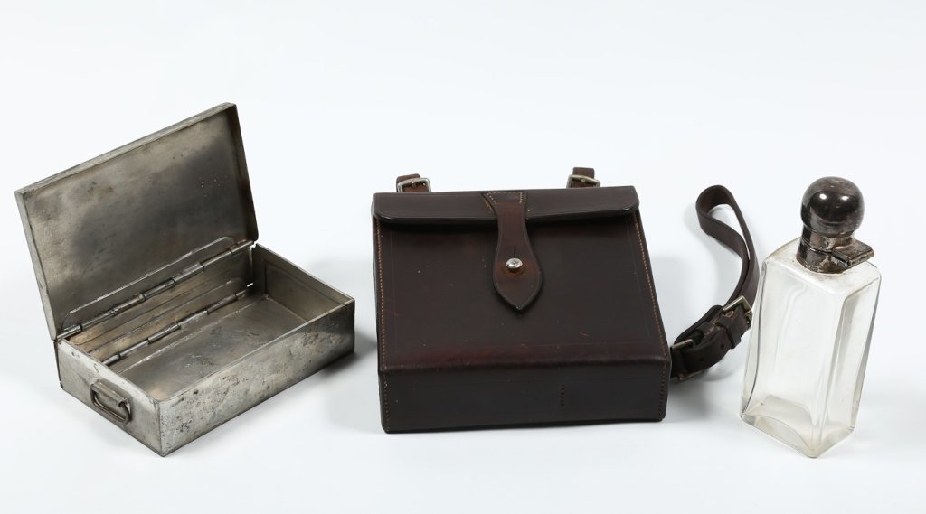 Fine English Equestrian Leather Riding Lunch Box: circa 1900. exceptionally well-crafted leather box housing glass decanter and sandwich box. marked at interior with initials "SPH" Miss Sara P. Herndon, Made in England.