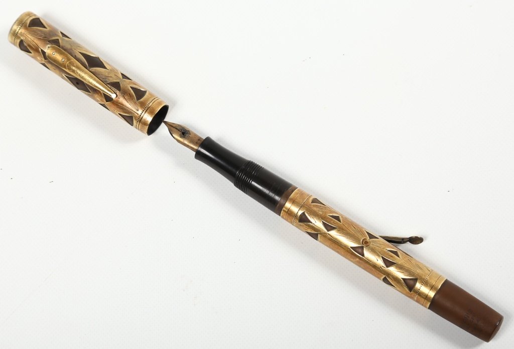 Vintage Waterman Art Deco Pen: early 20th century. ideal model having handsome hand-chased detail overlaid onto bronze shaft. L5 3/8”