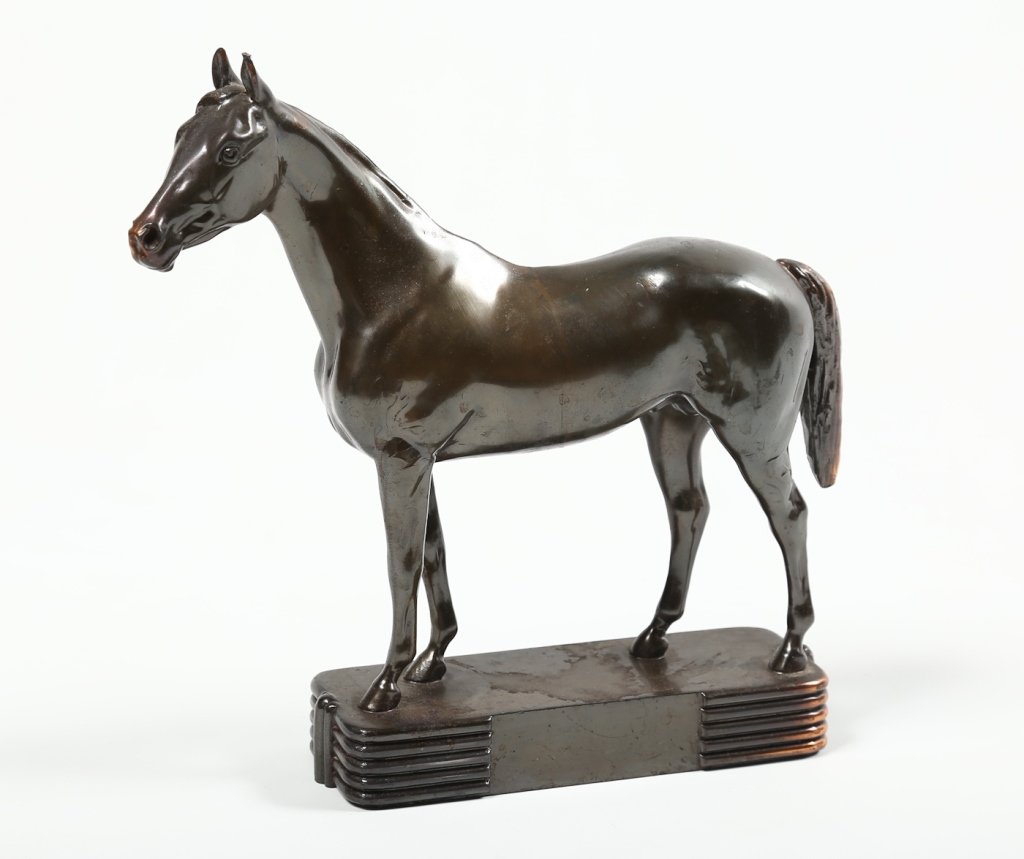 Art Deco Patanized Metal Horse Sculpture: early 20th century. well-formed figure of horse atop deco platform. unsigned, likely a trophy. H9 7/8" W10" Estate of Dale K. and Judy Firestone Thiel.