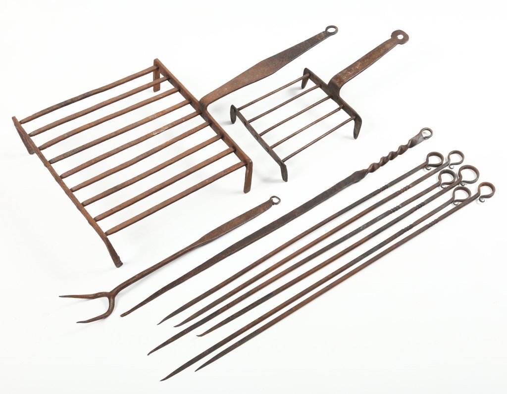 Antique Wrought Iron Fire Trivets: America or Britain, 18th or early 19th century. six meat skewers, two trivets and a large two prong fork.