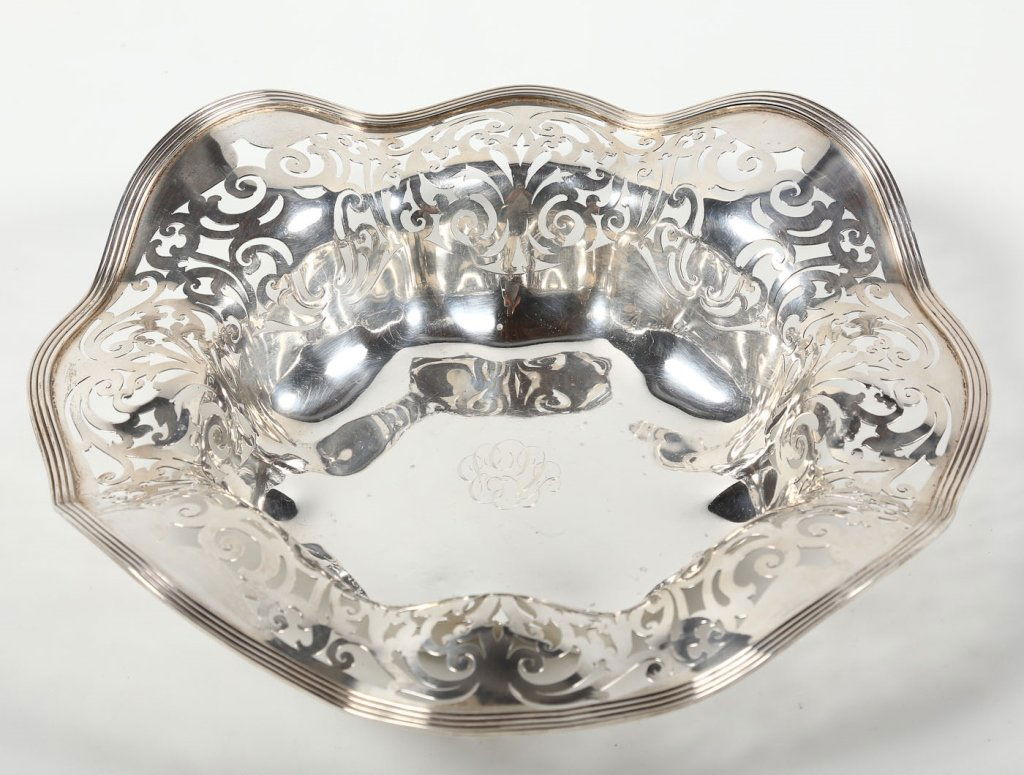 American Sterling Silver Center Bowl: by Wallace Silversmiths, Connecticut, early 20th century. waved edge upon reticulated body. monogrammed at the center. 23.8 oz standard H3 1/8” W12 ½”