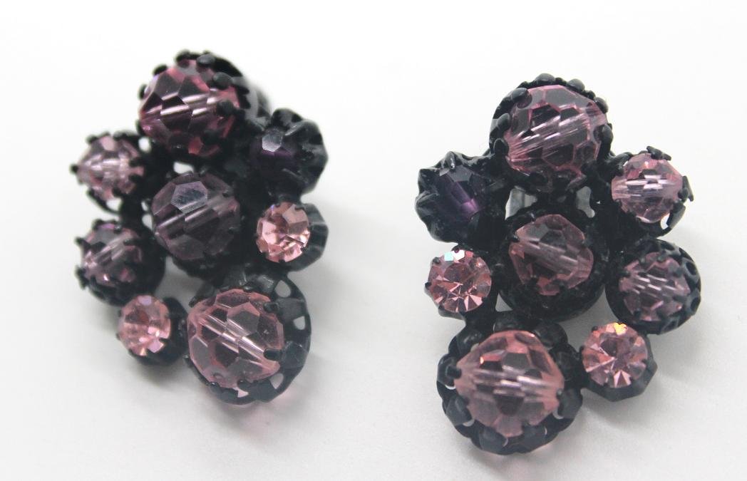 Vintage Made in Austria Pink Rhinestone Clip Earri: Signed Made in Austria. Pink rhinestone & hematite clip earrings. 1 1/2" in length & 1" wide.