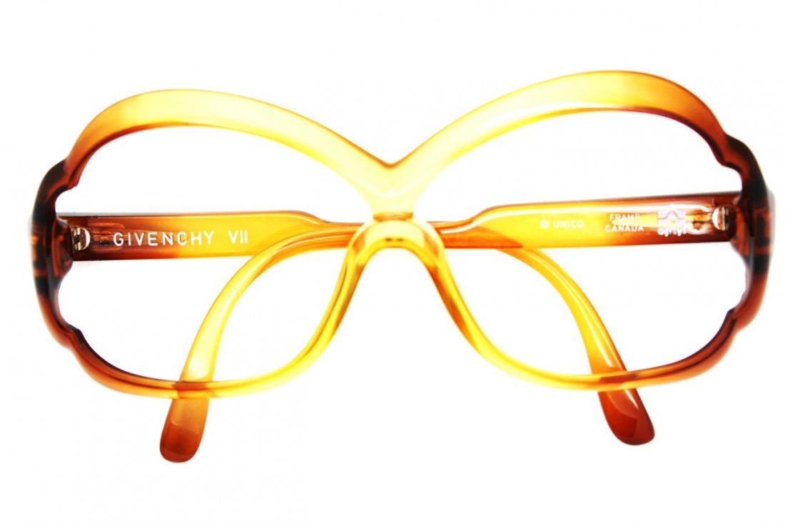 Vintage Unworn Brown Givenchy VII Eyeglass Frames: Unworn brown vintage Givenchy VII eyeglass frames Measure 5 1/2" wide, 2 1/2" in height & a 5" arm length Givenchy logo on temples Optyl "Made in Canada" Good conditon