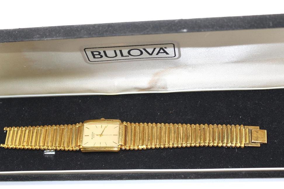 Vintage Gold Tone Bulova Watch in Box: Gold vintage Bulova. Needs repair on latch.