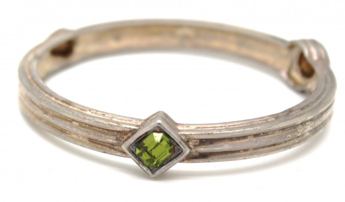 26: Vintage Givenchy Silvertone Rhinestone Bracelet: Vintage Givenchy Silver Tone Rhinestone Bangle Bracelet Silver metal with 3 large rhinestones on each side Green square, pink pear & yellow round rhinestones Measures 10" around and 1/4" wide Good con