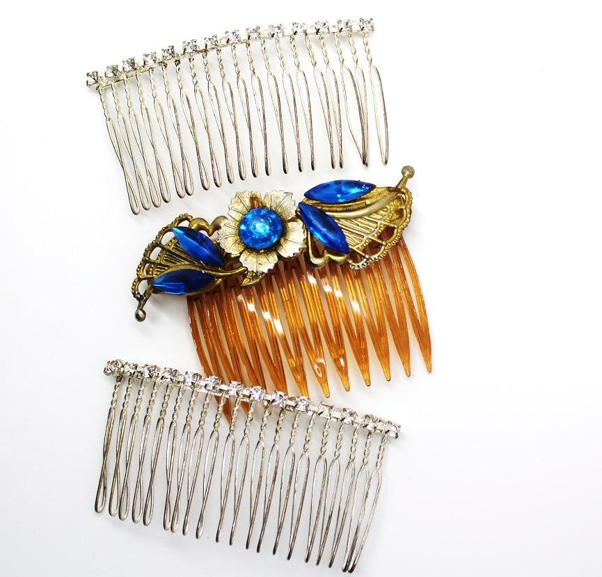 137: Vintage Lot of 3 Rhinestone Haircombs: Two silver metal with clear rhinestones. One brown plastic with pretty goldtone design with large blue rhinestones.