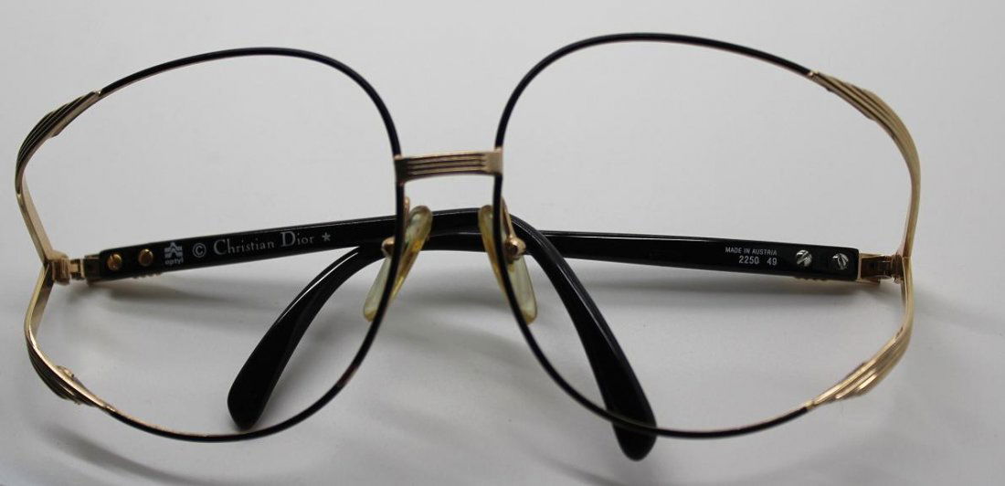 160: Vintage Christian Dior Frame Glasses: Model# 2250 49. Made in Austria with black & gold frame without lenses.