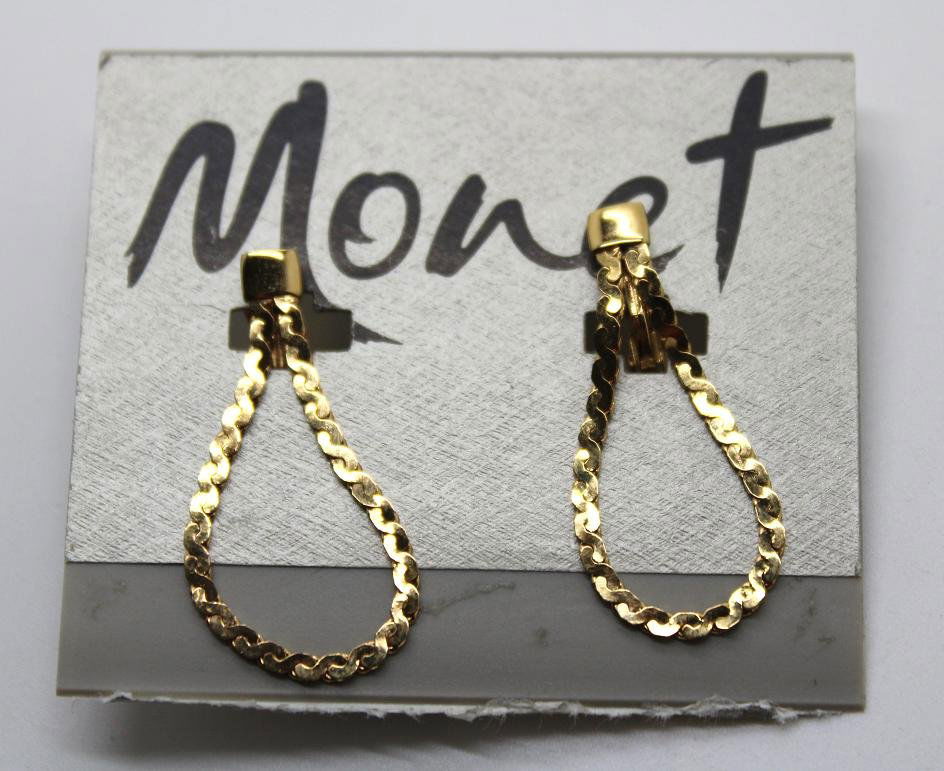 225: Vintage Monet Gold Clip Earrings: Unworn on post. 1 1/2" long.