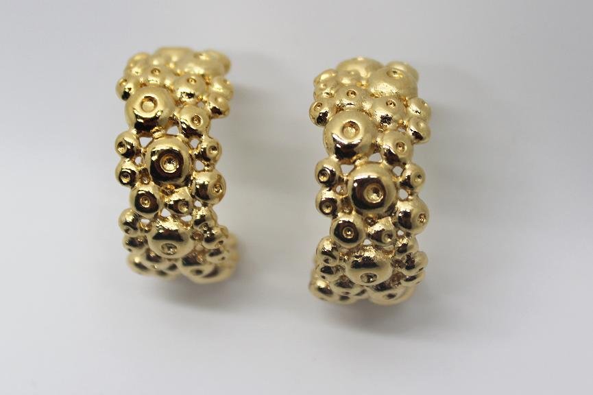 260: Vintage Givenchy Gold Crescent Post Earrings: Signed Givenchy. Gold tone textured circle design, crescent shaped post earrings. 2" in length & 1/2" wide. Need backs.
