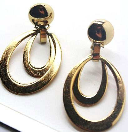 Vintage Gold Tone Monet Hoop Clip Earrings: 2 1/2" long.