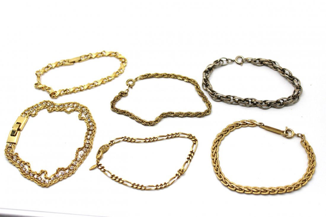 Lot of 6 Vintage Gold Tone & Silver Link Bracelets: One Avon, one rhinestone