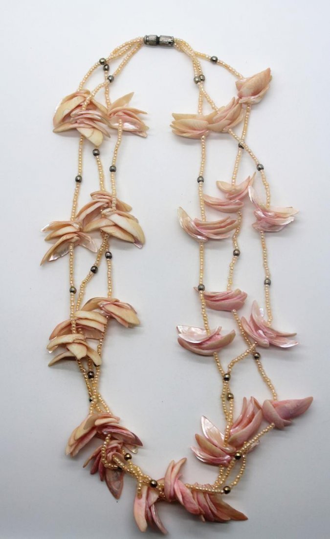 266: Vintage Pink Multi Strand Bead & Shell Necklace: Delicate pink beads with seashells. 22" length.