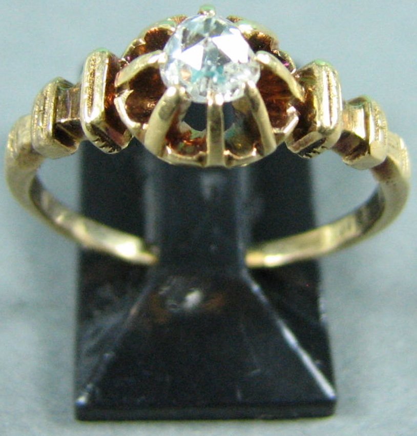 14K Yellow Gold Ring: tested, with sprong-set solitaire diamond, 1.7 dwt