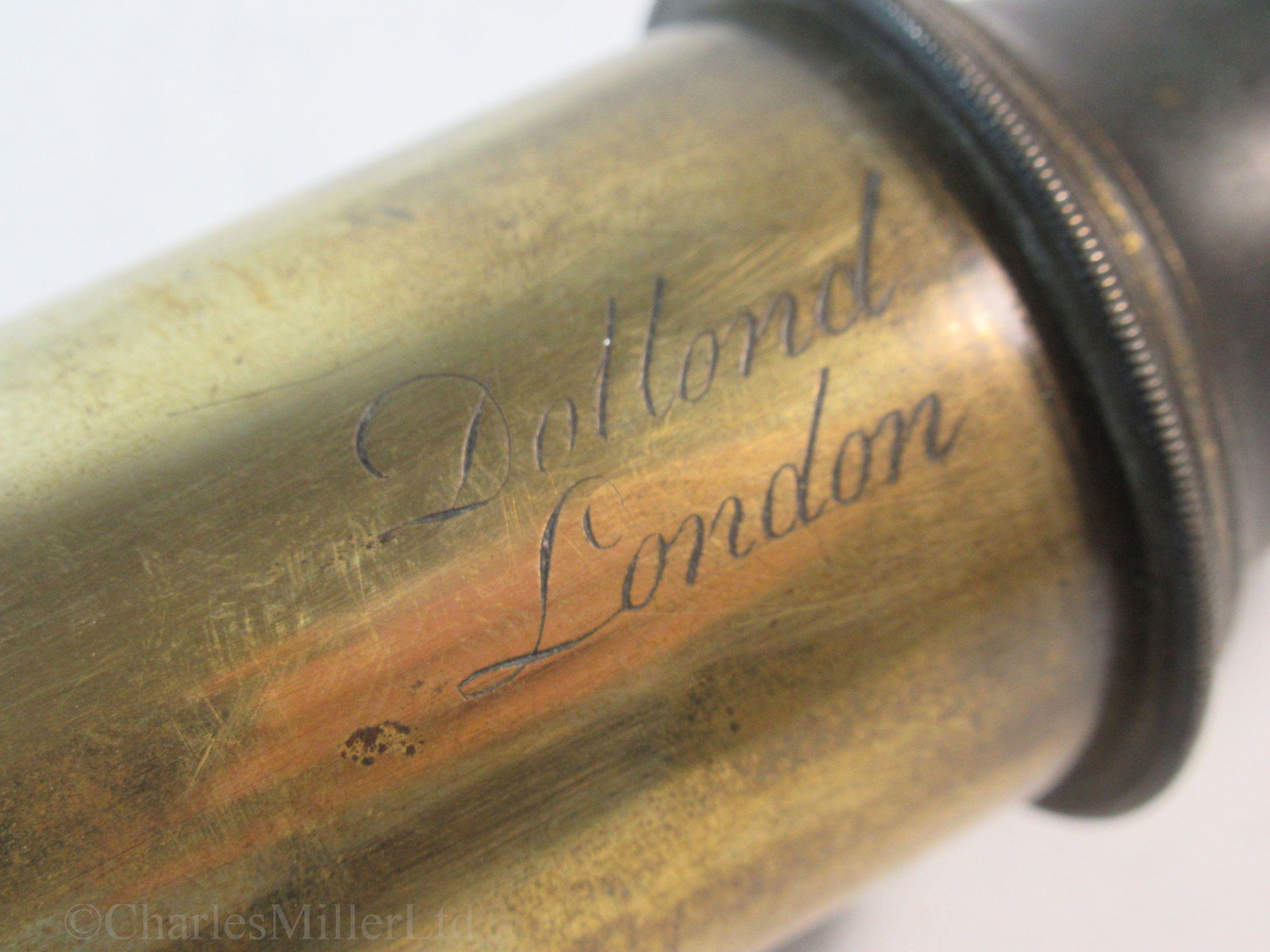 A 2IN. MARINE TELESCOPE BY DOLLOND, CIRCA 1790: A 2IN. MARINE TELESCOPE BY DOLLOND, CIRCA 1790 the tapering wooded tube with remnant painted finish, signed on the single draw tube as per title with tapering eye cup, dust slide and splash cuff -- 38