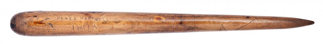Ø AN EARLY 19TH-CENTURY LIGNUM VITAE FID of typical tap: Ø AN EARLY 19TH-CENTURY LIGNUM VITAE FID of typical tapering form, stamped and dated JAMES HARTNELL 1803 -- 19½in. (49.5cm.) long ++Typical marks and abrasions commensurate with age, two or three sc