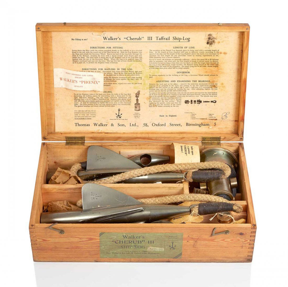 A WALKER'S CHERUB MARK III SHIP LOG: A WALKER'S CHERUB MARK III SHIP LOG, apparently unused and contained in original pine box with two oxidised brass propellers and wrapped components, with instructions painted inside lid and maker's la