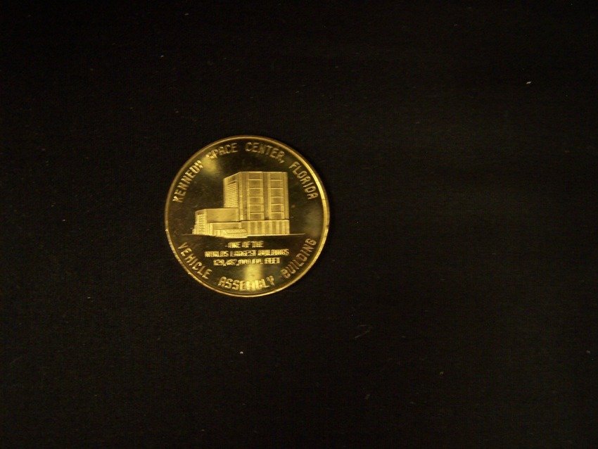 Uncommon Kennedy Space Center VAB Coin: Gold plated 1960's coin From the estate of a Joel H. Taft a 40 plus year veteran of Grumman Aerospace Corporation